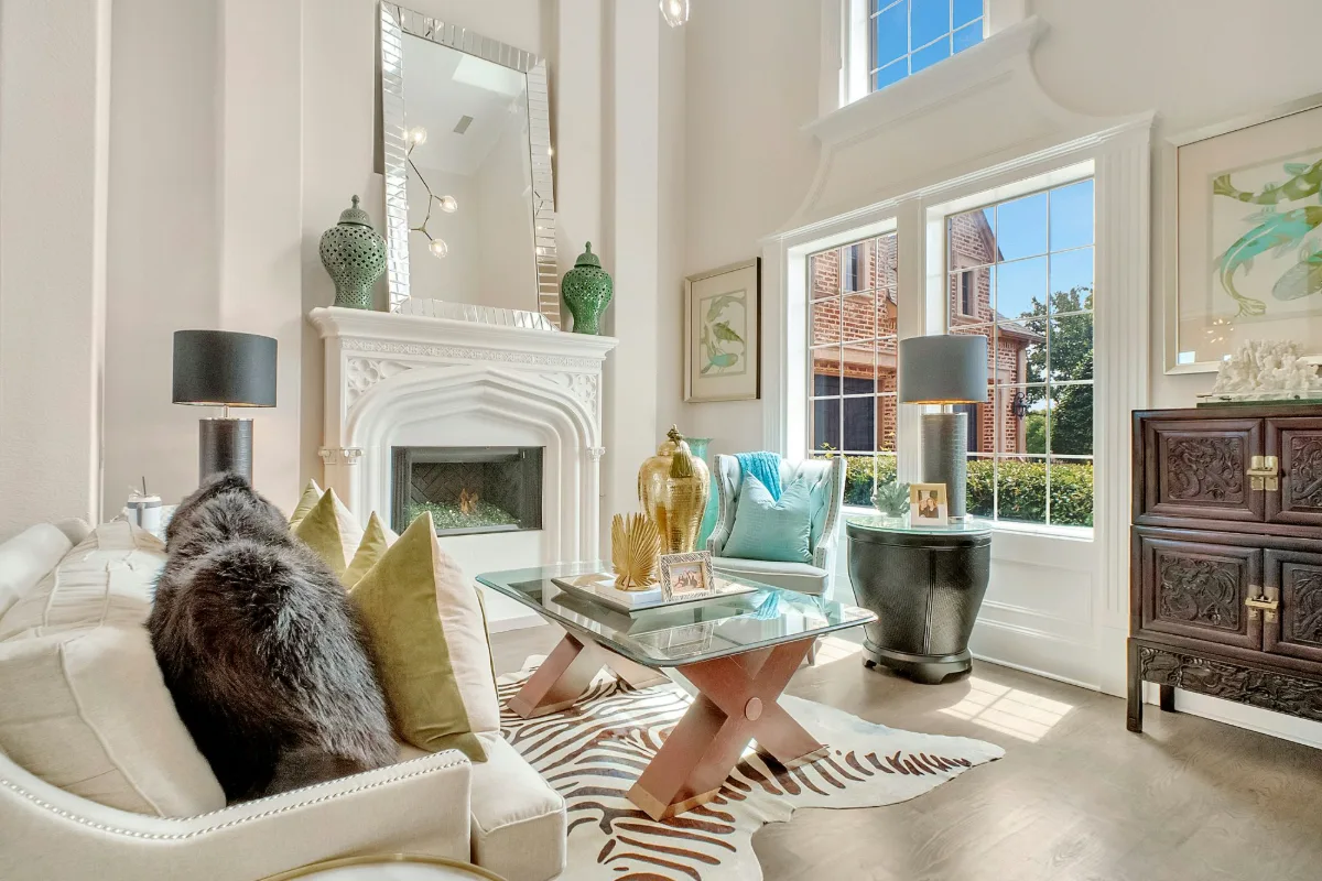 Bright, balanced interior of a staged living room after professional real estate photo editing